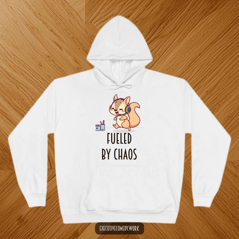 Funny hoodie design of a playful squirrel wearing a headset, dashing across a desk with great speed and energy.