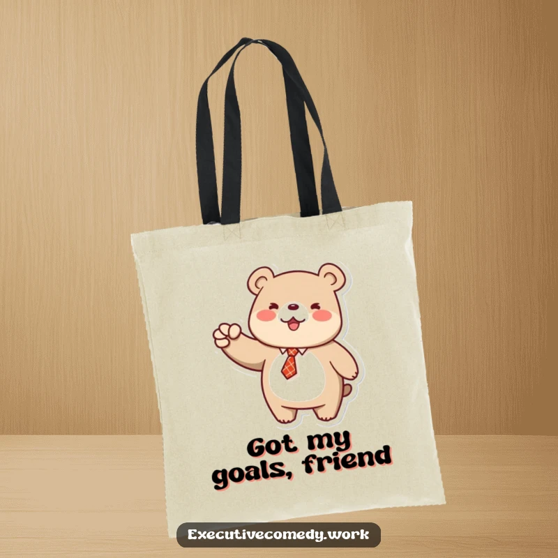 Funny tote bag featuring a smiling bear in a tie pumping its fist, ready for action and carrying essentials.